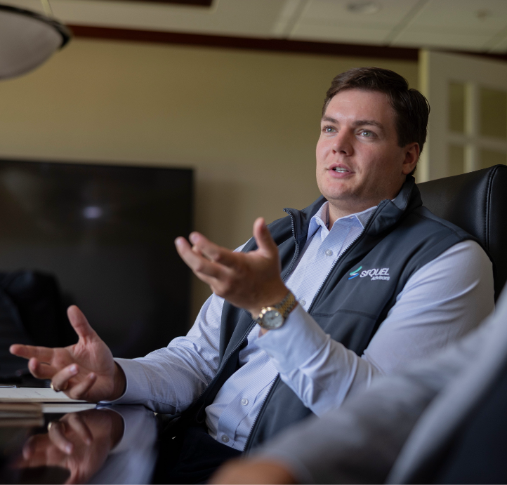 A man explaining his point of view at a conference table